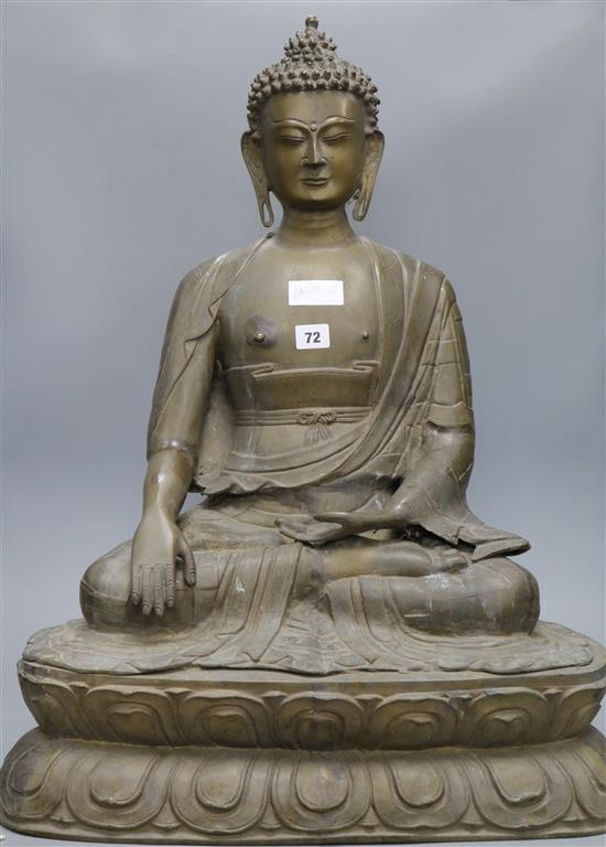 A large bronze seated figure of a Buddha shakyamuni height 69cm